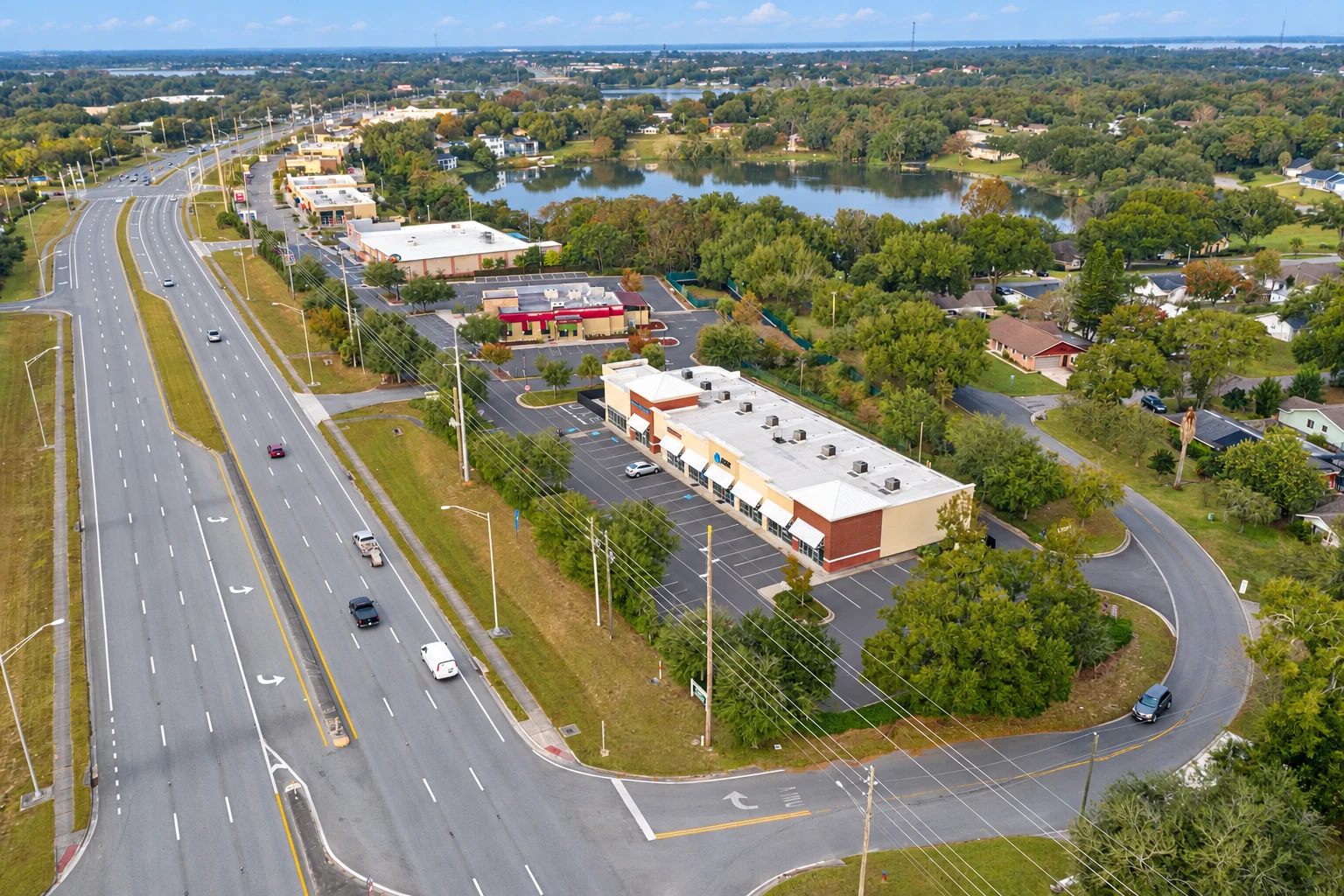Aerial view of the Shoppes shopping plaza with its parking area